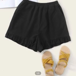 never worn black shorts